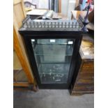 A Victorian ebonised display cabinet