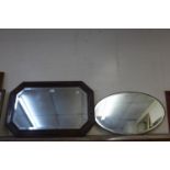 Two oak framed mirrors