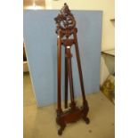 A carved mahogany artist's easel