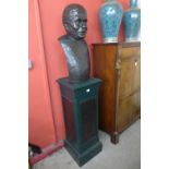 A bronze bust of a man, on painted pedestal, overall height 183cms h
