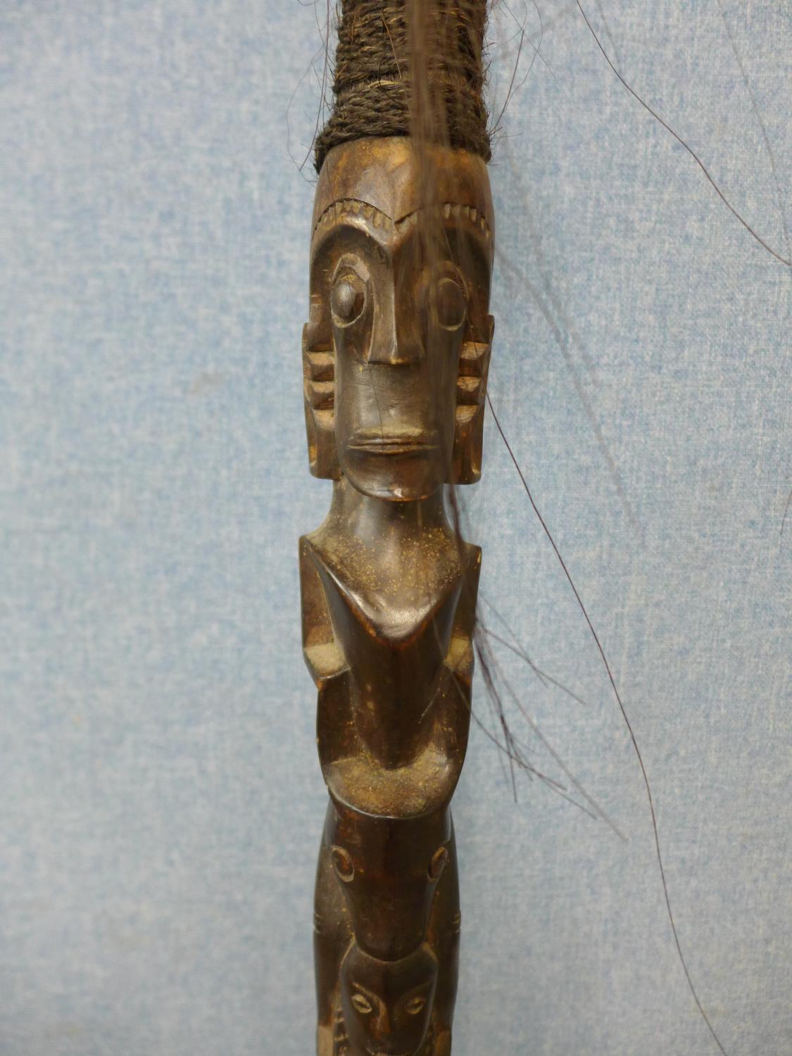 An Indonesian Batak carved staff on stand - Image 2 of 2