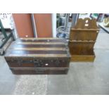 An oak and metal mounted steamer trunk and an oak rack