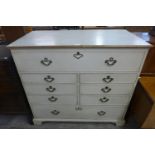 A George III painted oak chest of drawers (top adapted to lift up)