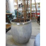 A galvanised dolly tub and plant climbing frames