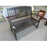 A teak garden bench