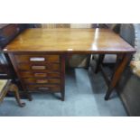 An early 20th Century oak desk