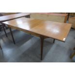 A McIntosh teak extending dining table