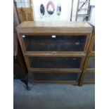 A Globe Wernicke oak three tier sectional stacking bookcase