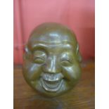 A small bronze four faced Buddha, 12cms h