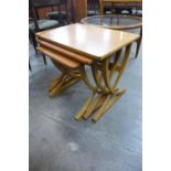 A Nathan teak nest of tables