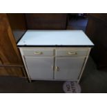 A 1960's painted metamorphic kitchen cabinet