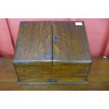 A Victorian oak desk top letter cabinet