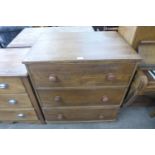 A pine chest of drawers