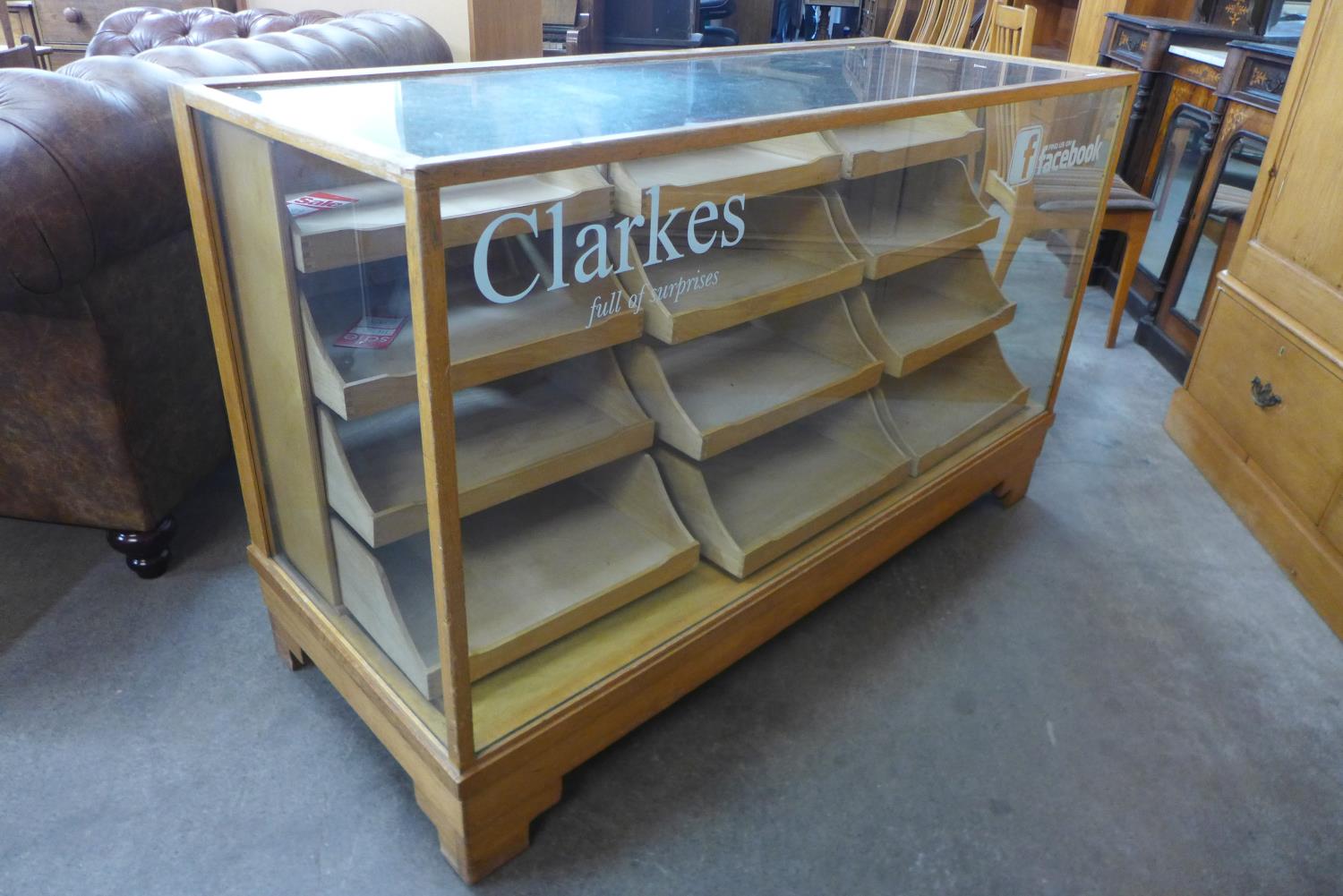 An oak nine drawer shop cabinet