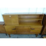 A teak highboard