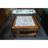 A teak and tiled top coffee table and a coffee table