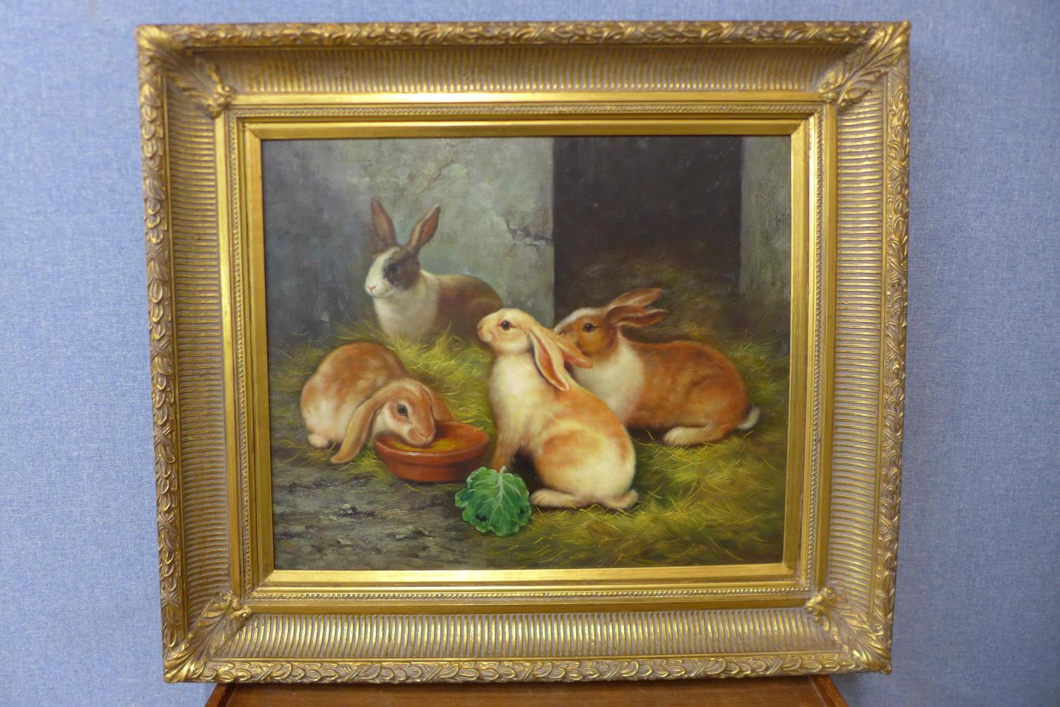 A study of four rabbits in a barn, oil on canvas, 50 x 60cms, framed