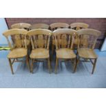 A set of eight beech kitchen chairs