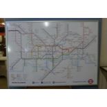 A London underground map, framed, 101 x 141cms