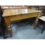 A Victorian pine drop-leaf kitchen table