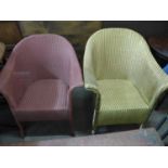 Two painted wicker armchairs