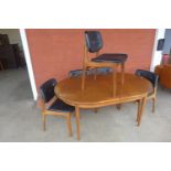 A G-Plan Fresco teak extending dining table and five teak dining chairs