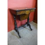 A Victorian inlaid walnut lady's sewing table
