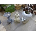 A galvanised watering can, concrete deity figure and a small figural cast iron planter