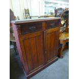 A Victorian mahogany two door cupboard