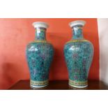 A pair of similar Chinese poreclain famille vert vases