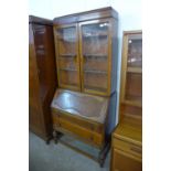 An Art Deco oak bureau bookcase