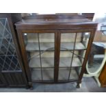 An oak two door display cabinet