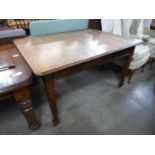 A Victorian oak dining table