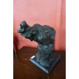 A bronze figure of a bear, on marble plinth