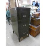 A painted steel three drawer filing cabinet