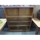 A mahogany open bookcase