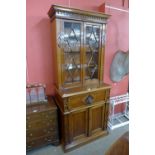 A Victorian fiddleback mahogany library bookcase, 212cms h, 89cms w, 58cms d