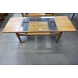 A G-Plan Fresco teak and glass topped coffee table