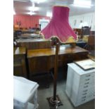 An Edward VII mahogany standard lamp