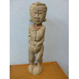 An Indonesian Batak carved wood figure of a nude woman