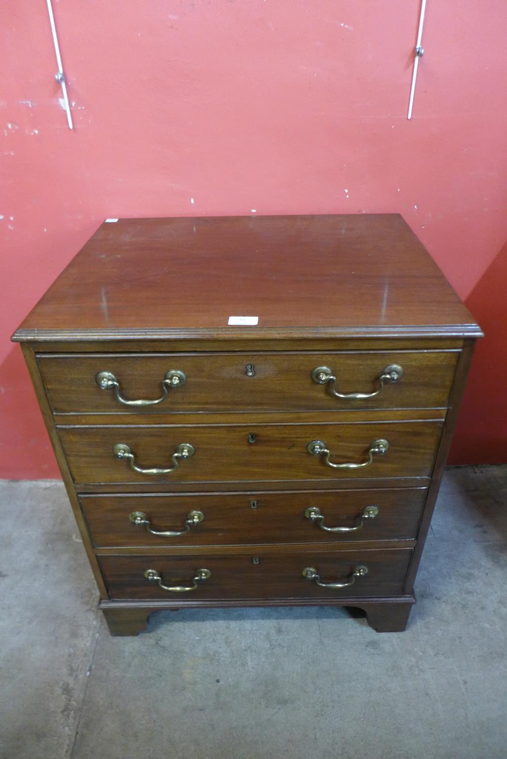 A George III style mahogany bachelors chest of drawers