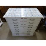 A painted pine chest of drawers