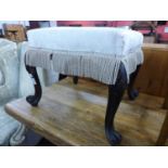 A Victorian rosewood footstool