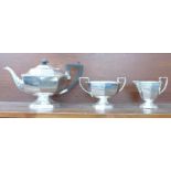 An Art Deco three piece plated tea service, marked Triple Plate