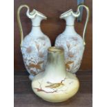 A pair of blush ivory vases, EFB & Son, Dorio pattern and a vase decorated with a bird on a