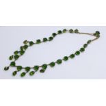 A .800 silver necklace set with green stones