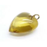 A citrine heart shaped pendant