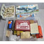 A Revell Phantom F-4K 1/72 scale model kit, playing cards, counters, and a box of cigarette cards