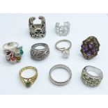 A collection of rings including silver