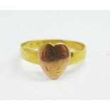 A Victorian 22ct gold ring with later applied heart shaped yellow metal plaque, 1.7g, N